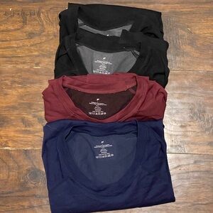4 pack of men’s Fabletics dri-fit tees. Size L.